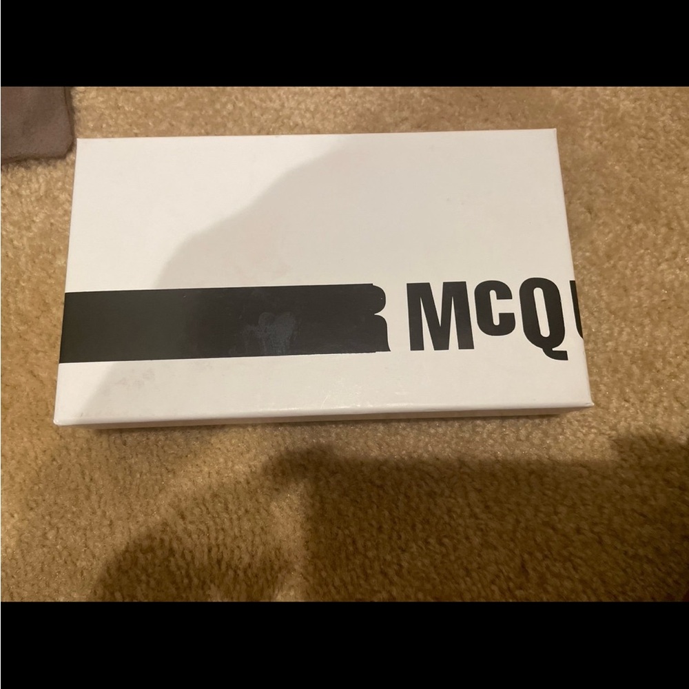 MCQ  zip around wallet  still in box never.
